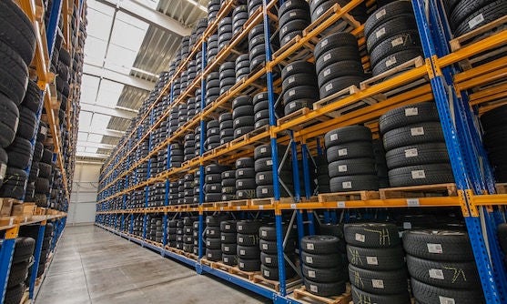 High rack with customer tires in warehouse of a tire dealer