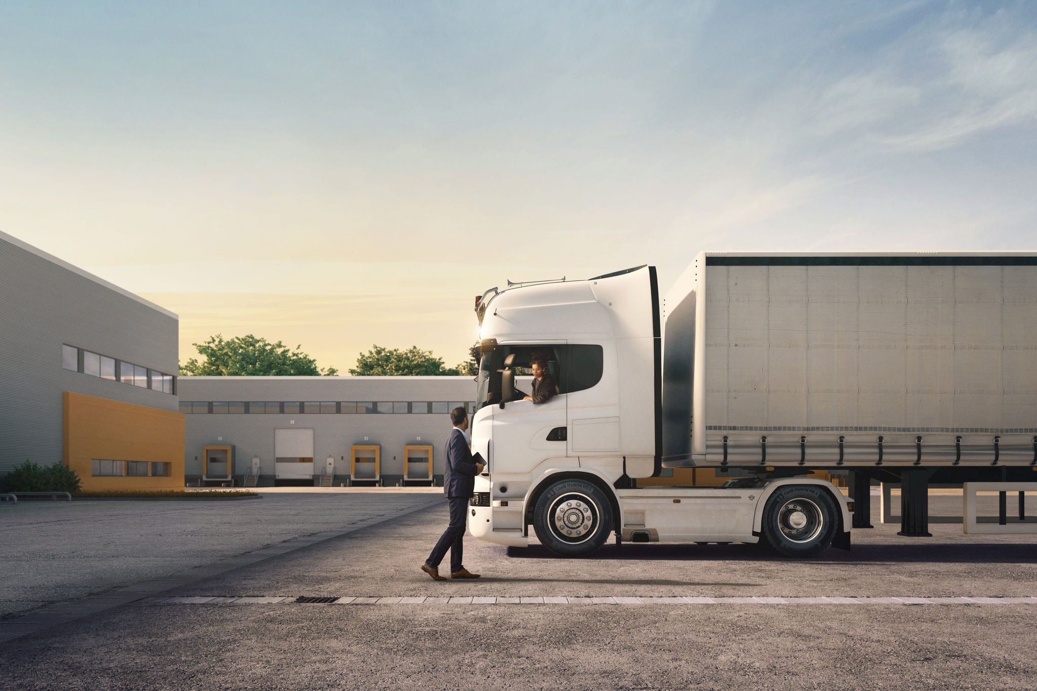 White Truck standing on grey ground