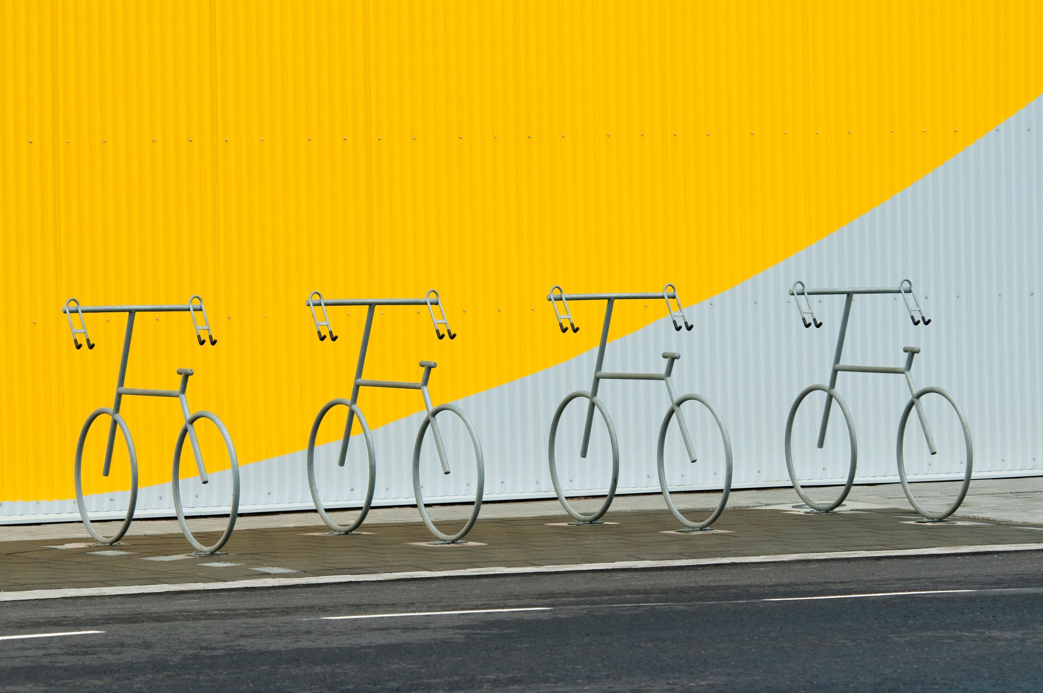 four bicycle holders in a design of a bicycle; Shutterstock ID 57340465; Purchase Order: -