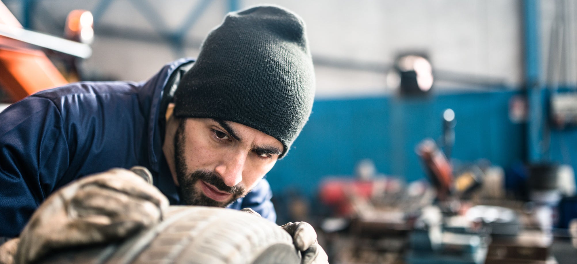 tire repairer checking the tire integrity