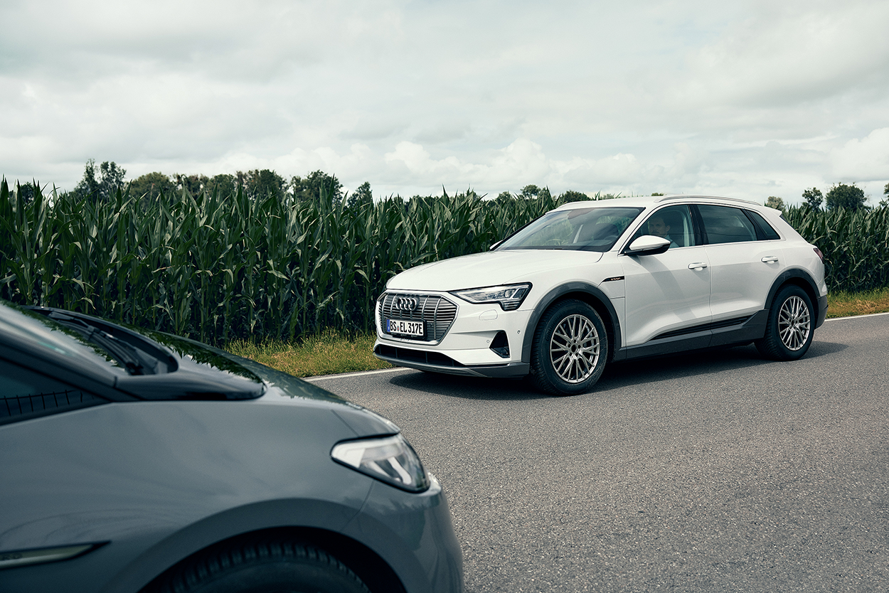 Two cars mounting Continental all-season tires